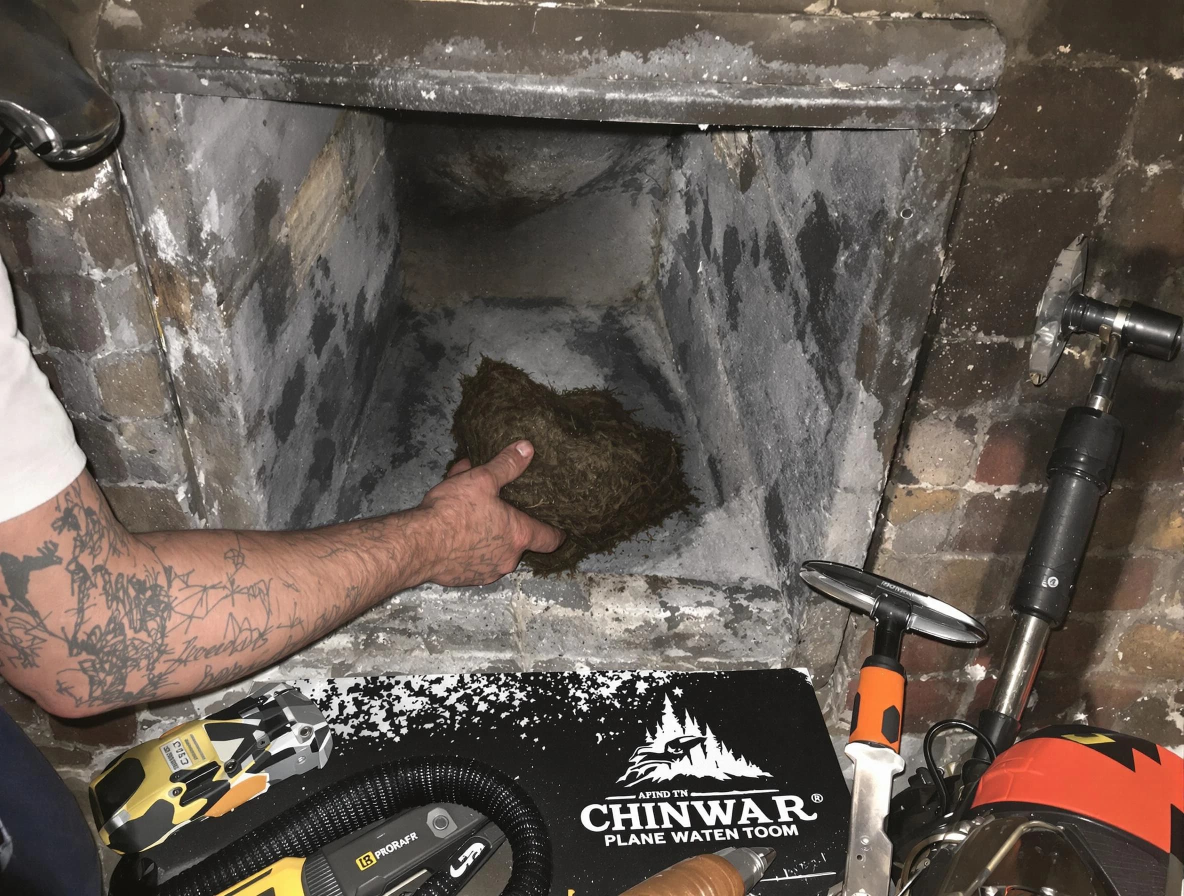 Castle Rock Chimney Sweep safely removing debris and screening chimney in Castle Rock, CO